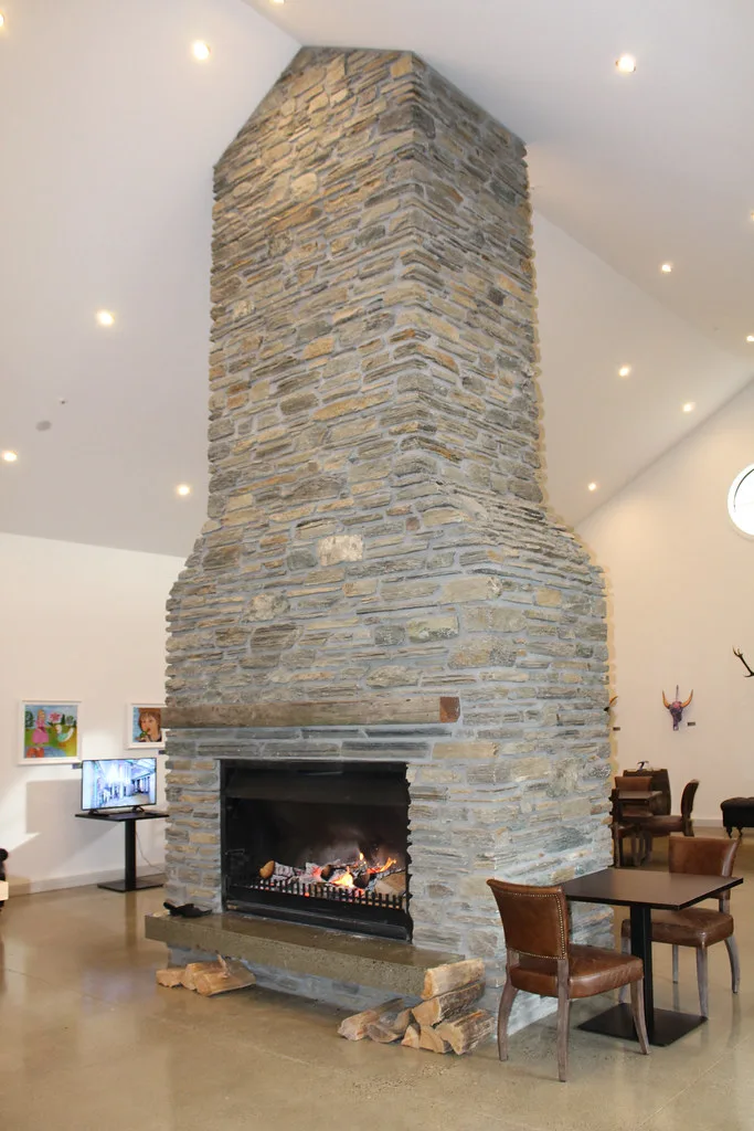 Tall schist chimney and fireplace, Cardrona Distillery